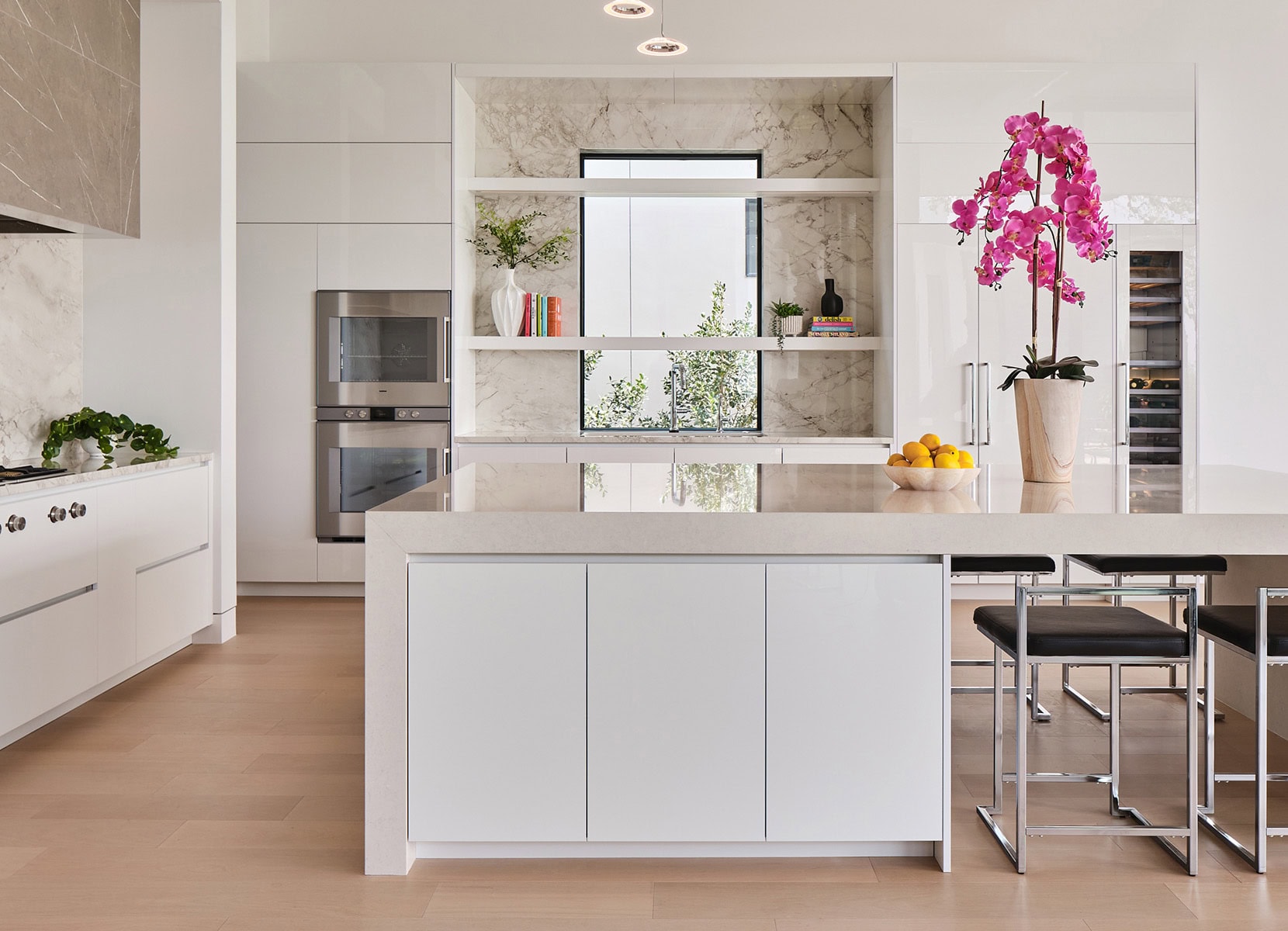 Statement hood and open shelving with marble in modern kitchen with custom cabinetry, The Dominion, San Antonio
