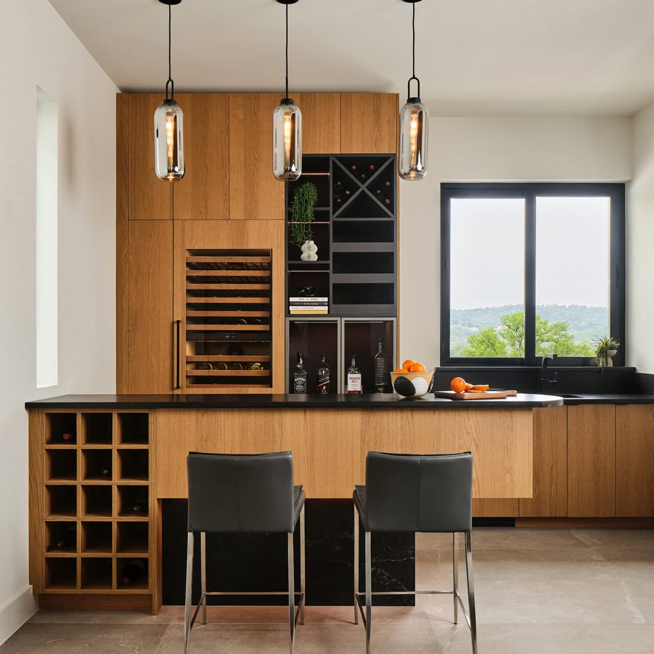 Custom built-in cabinetry with integrated wine storage and bar seating in The Dominion, San Antonio