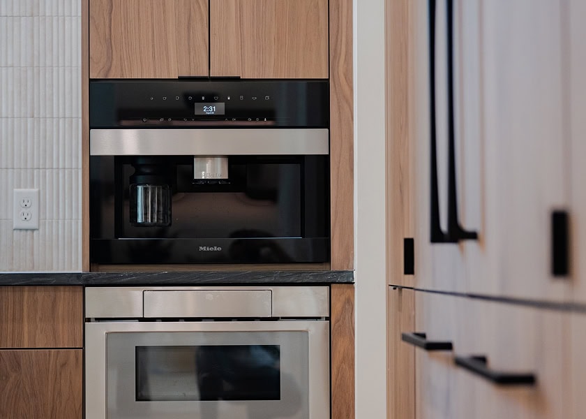 Modern kitchen cabinetry with a refined approach to storage and display